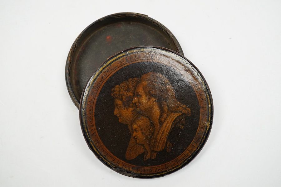 Death of Louis XVI and Marie Antoinette, a commemorative papier mache snuff box, 9cm diameter. Condition - some chipping and wear to edges, part of rim of cover missing